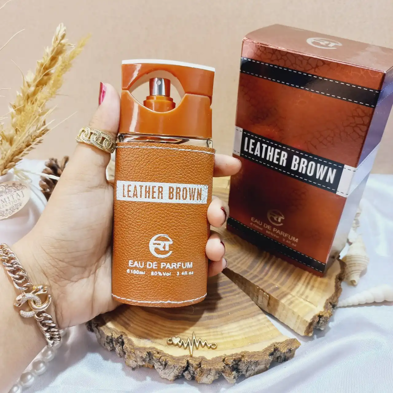 ادکلن مردانه آر تی مدل leather brown حجم 100 میلی لیتر اورجینال اماراتی