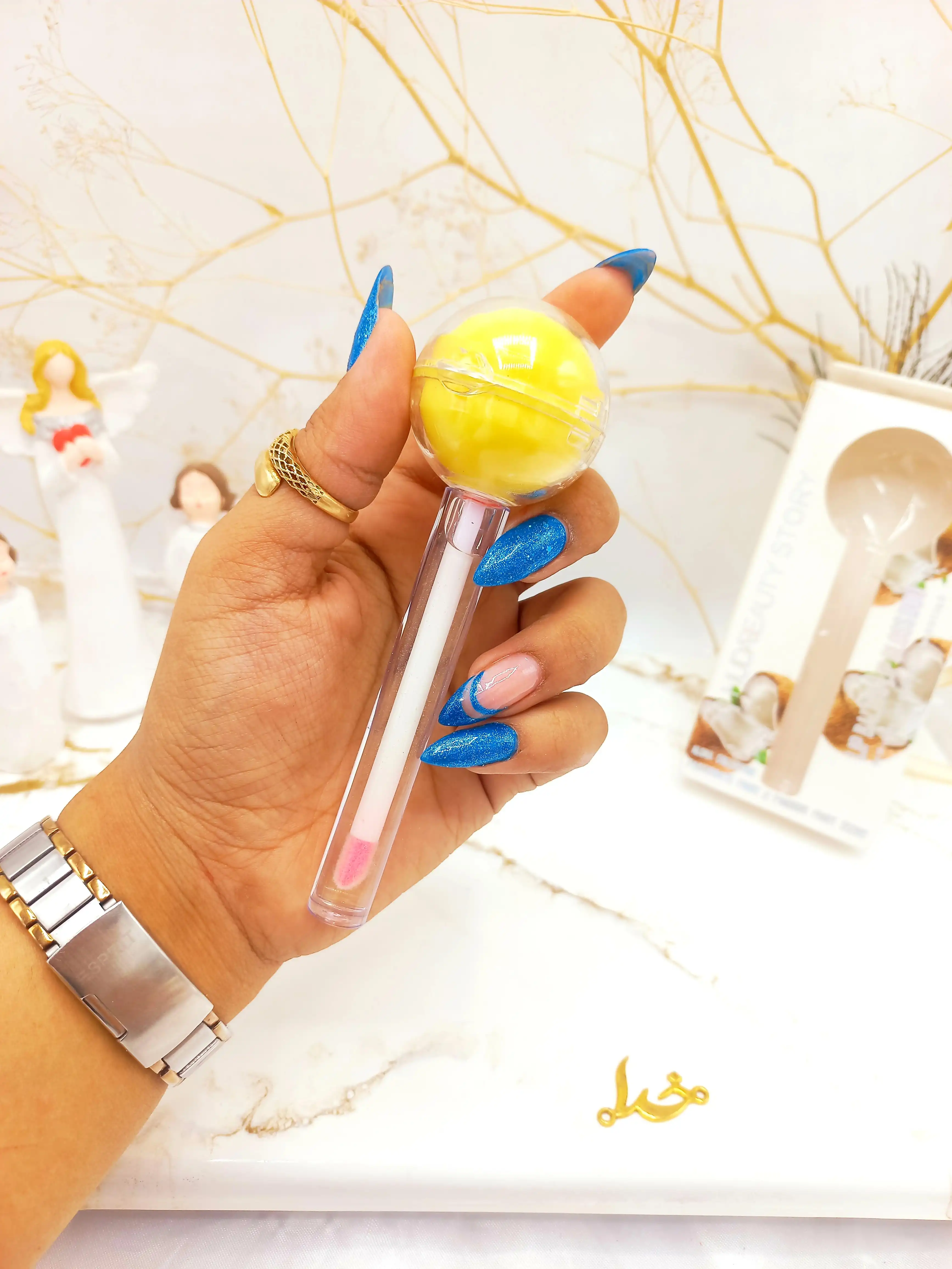 برق لب و بالم لب آبنباتی نارگیل هدا بیوتی استوری HUDA BEAUTY STORY