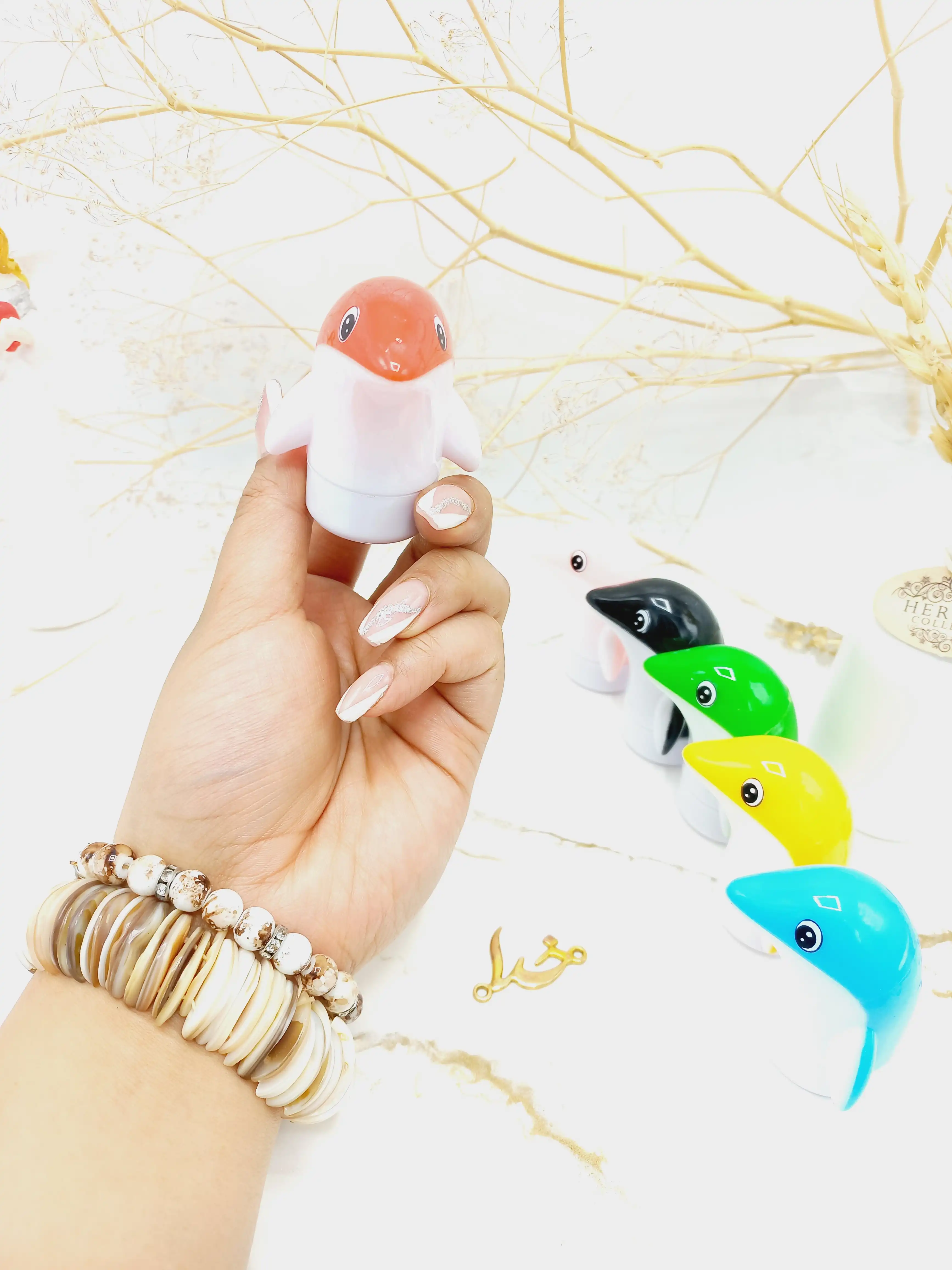 بالم لب طرح دلفین برند هوکسیا بیوتی HUXIA BEAUTY کد 1048