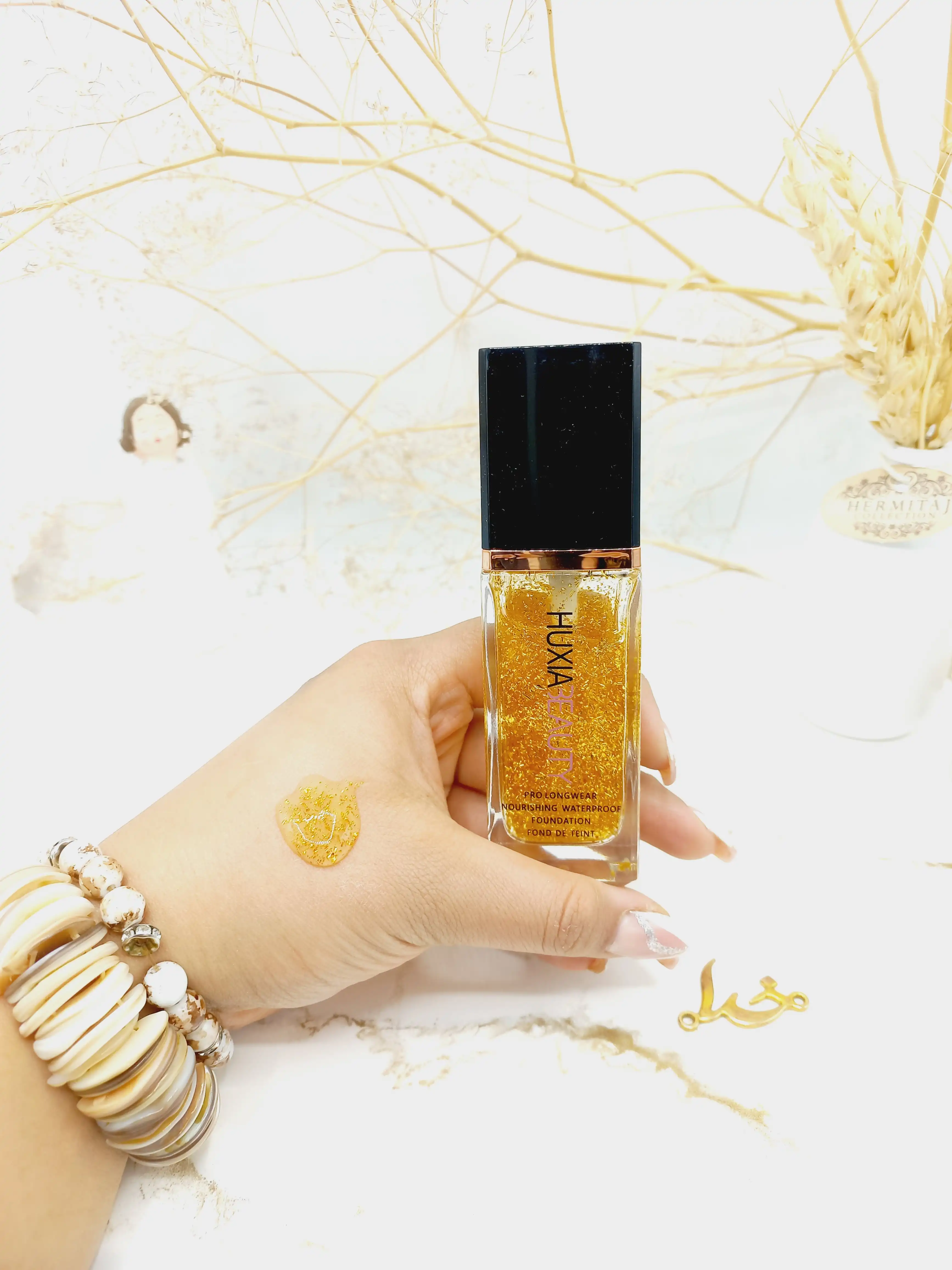 پرایمر طلا برند هوکسیا بیوتی HUXIA BEAUTY کد F232