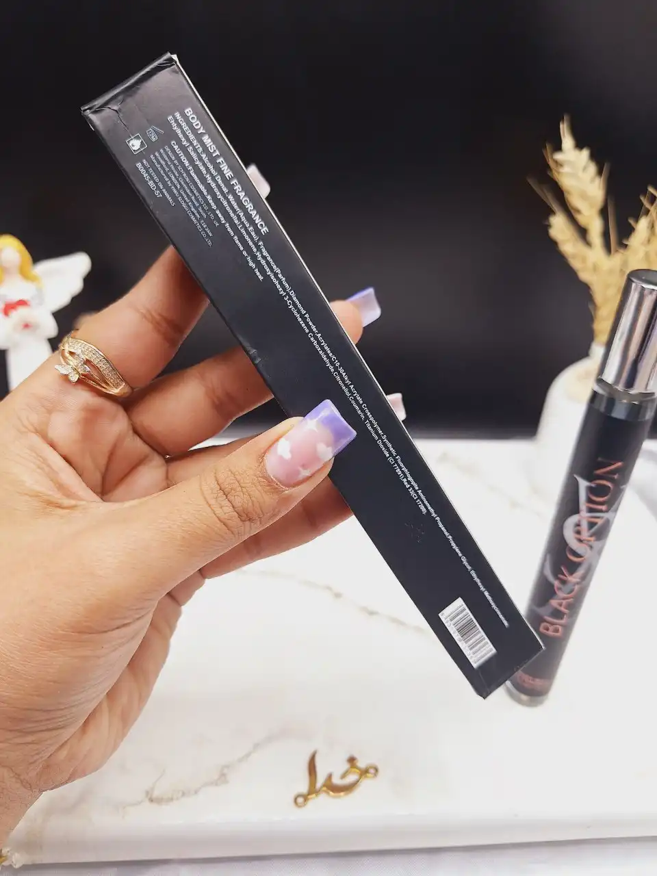 ادکلن استوانه ی 35ml BLACK OPTION کد 1363