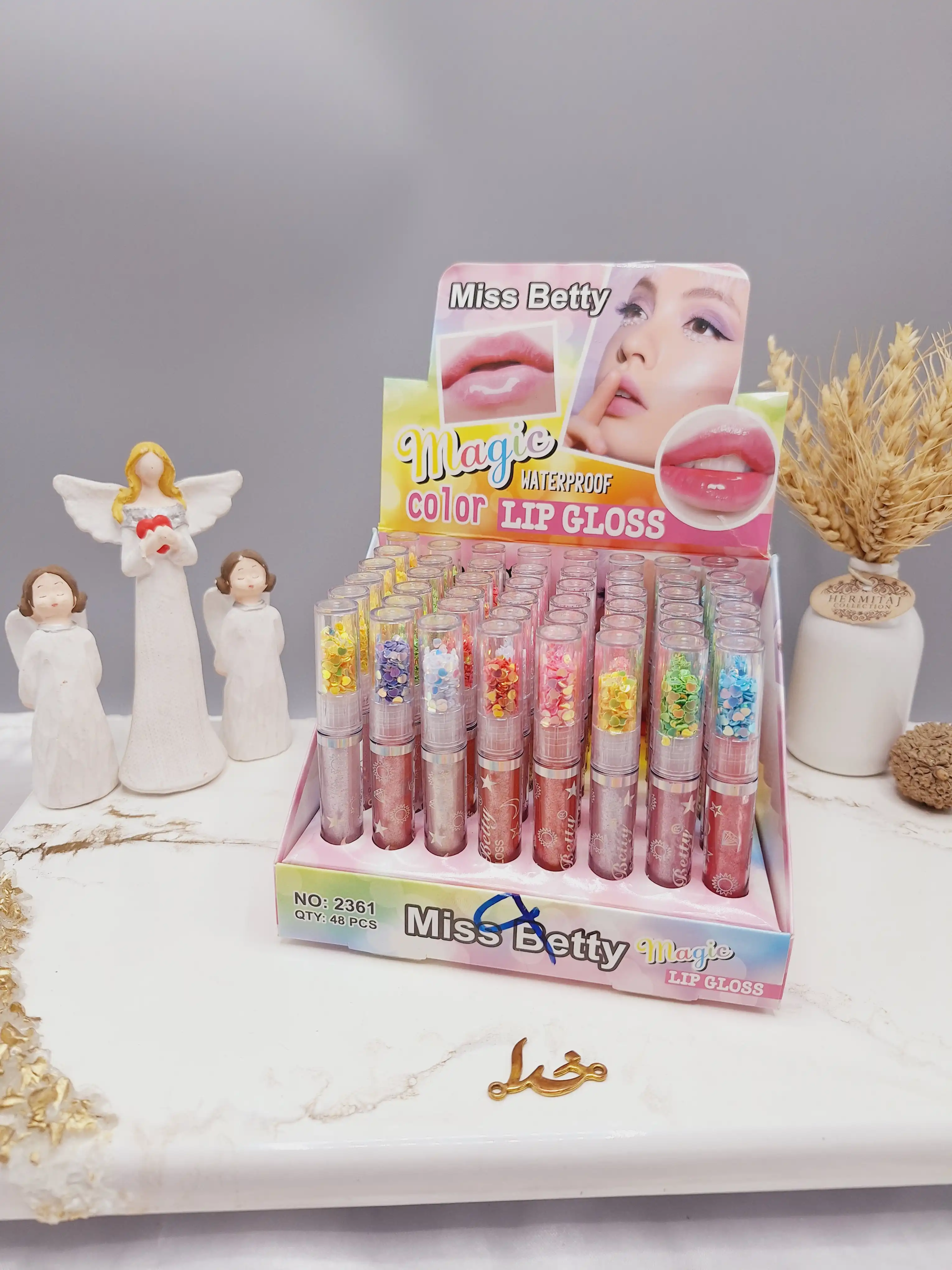 لیپ گلاس شاین دار درب اکلیلی برند میس بیوتی Miss Betty کد 2361