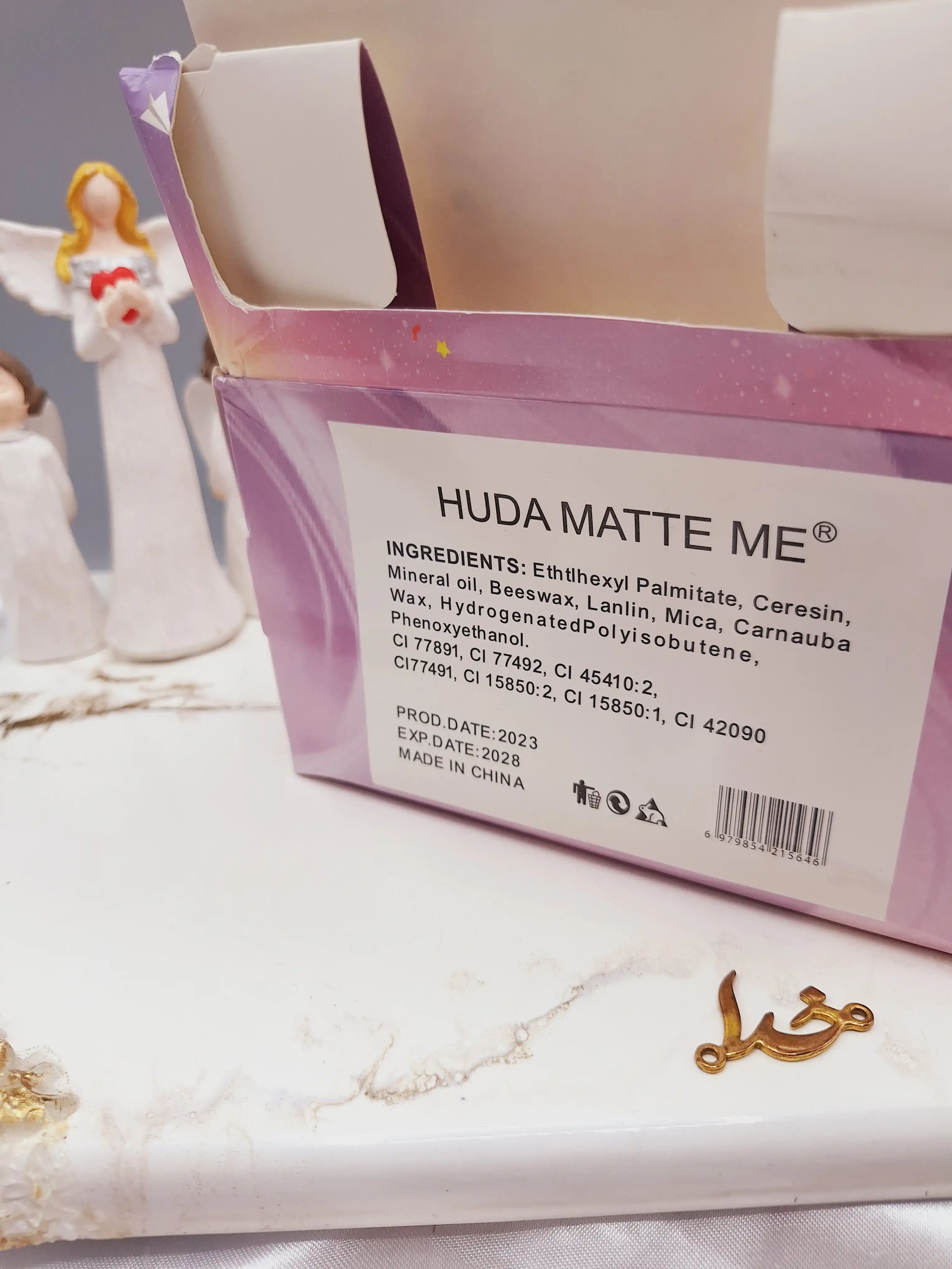 لیپ گلاس شاین دار  طرح فانتزی برند هدا مات می HUDA MATTE ME کد X-358