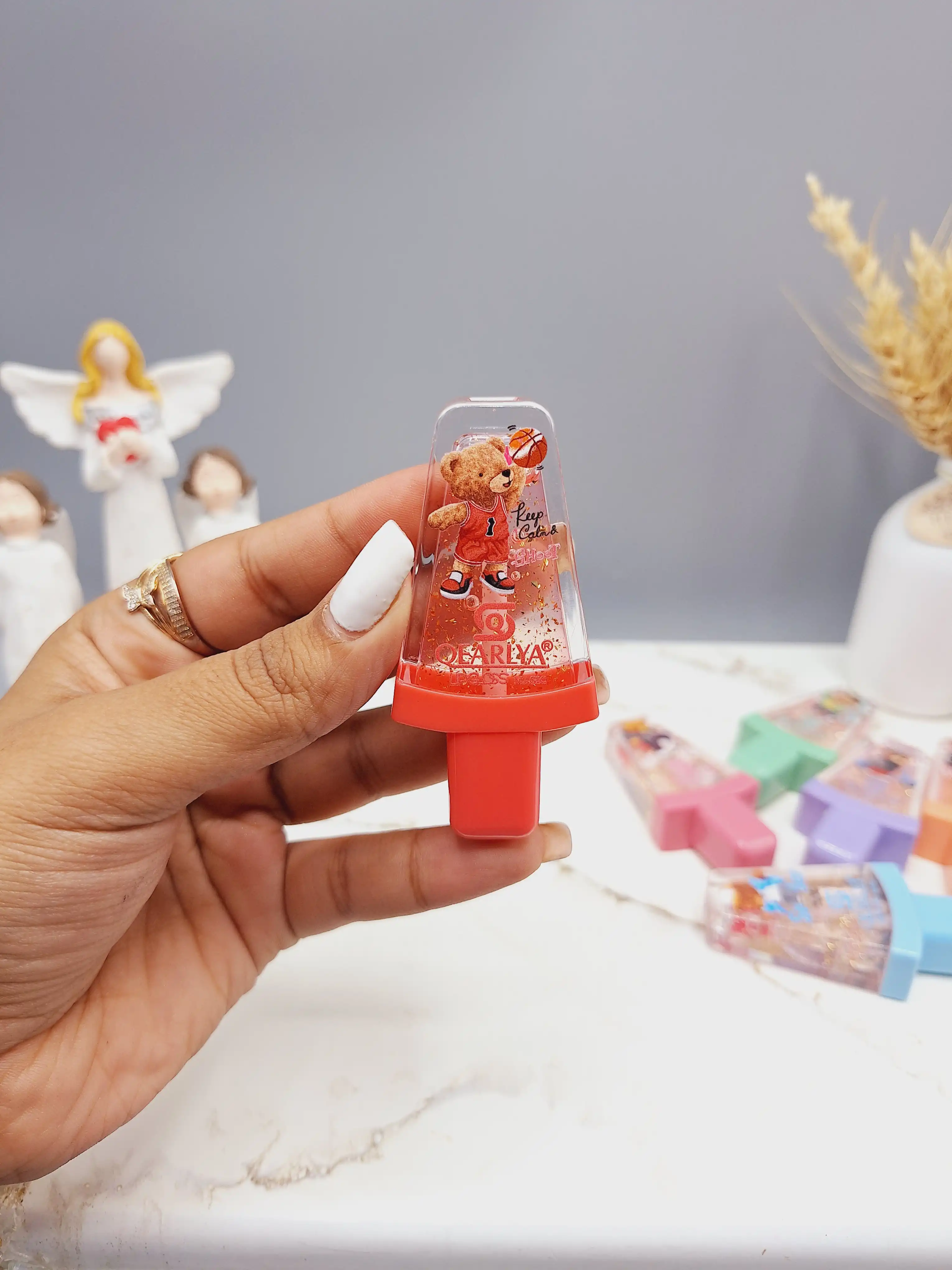 برق لب شاین طرح خرس قهرمان برند MAGIC LIPGLOSS کد NO:QE7183-A