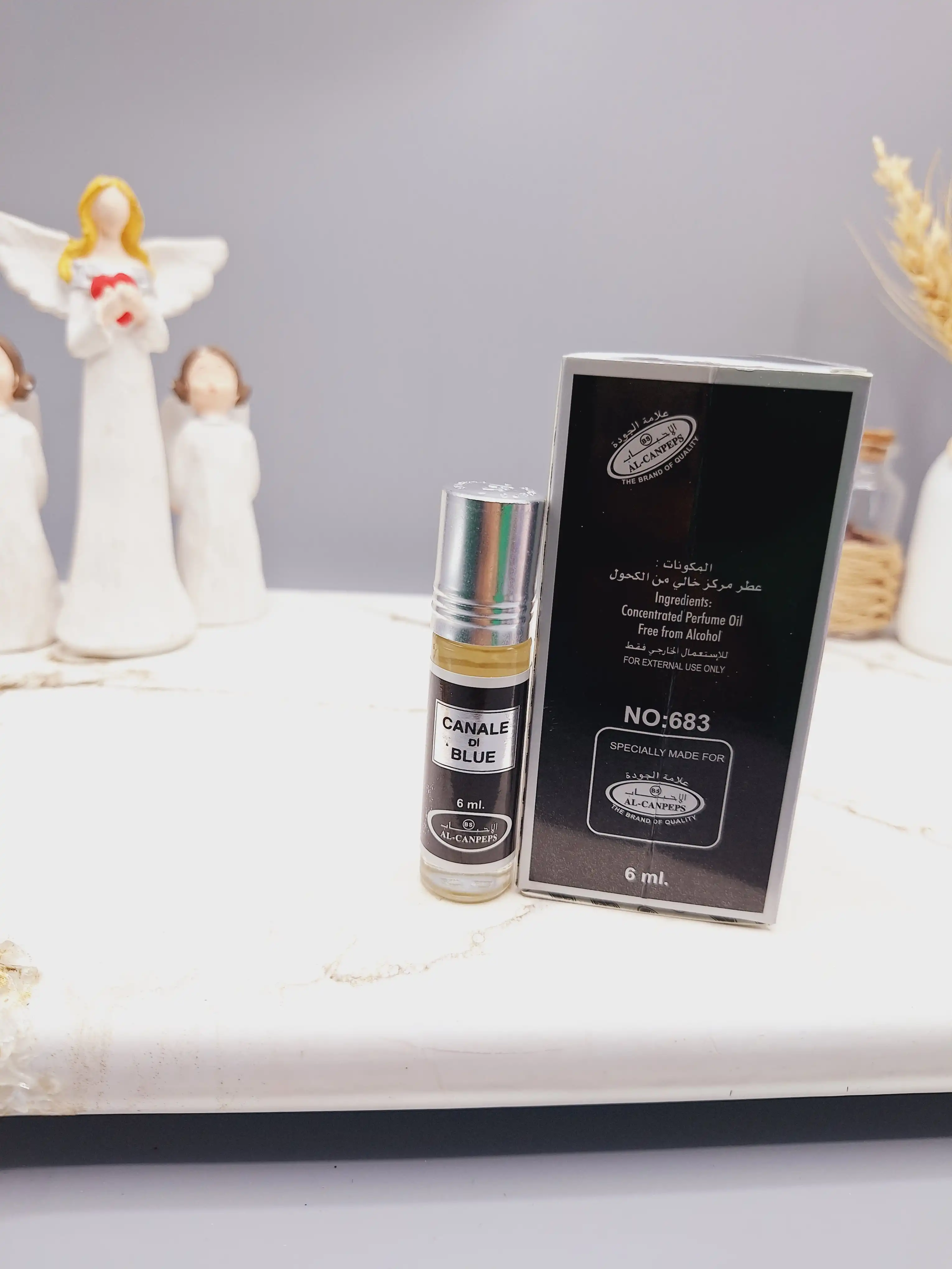 عطر 6 میل بدون الکل مدل CANALE DI BLUE مردانه کد 683