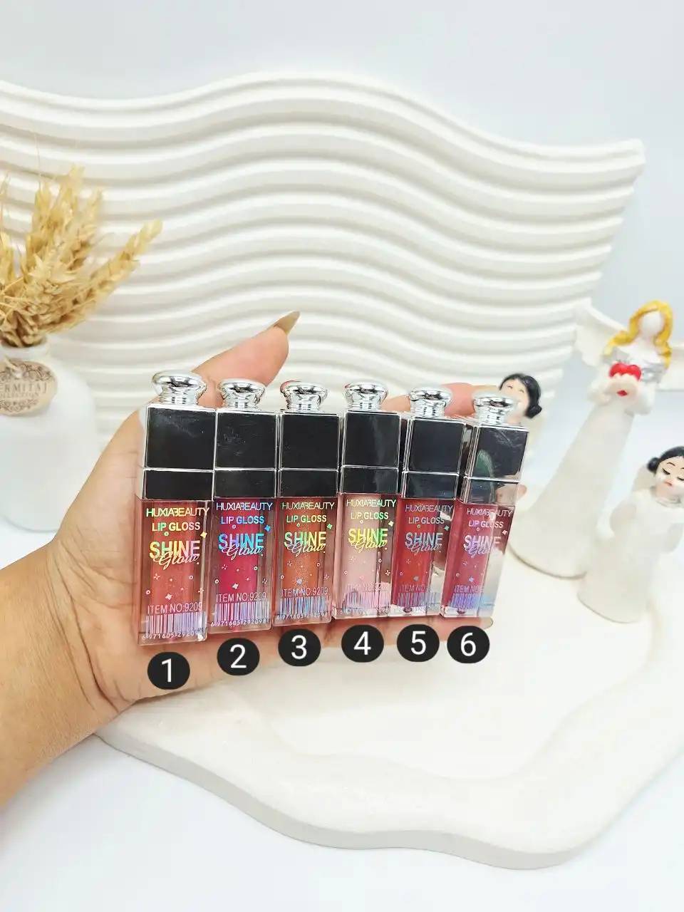 برق لب شاین‌دار هدی بیوتی HUDA BEAUTY کد 9209
